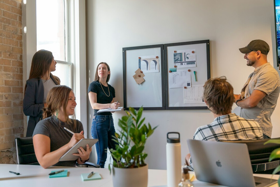 woman leading business meeting